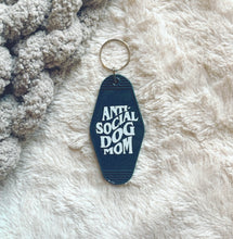 Load image into Gallery viewer, Anti Social Dog Mom Motel Keychain
